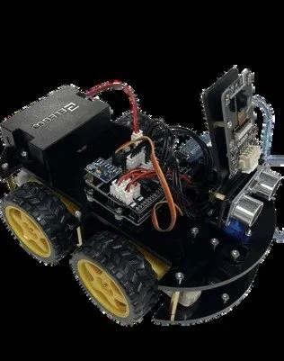 A small black Arduino rover with yellow wheels